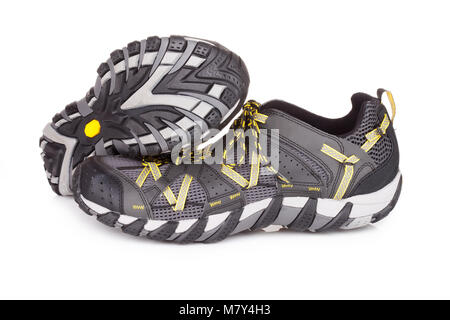 Trail Running Schuhe, isoliert auf weißem Stockfoto