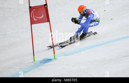 Pyeongchang, Südkorea. 14 Mär, 2018. Giacomo Bertagnolli von Italien konkurriert während der Ski Alpin Männer Riesenslalom Sehbehinderte Lauf 2 am 2018 PyeongChang Winter Paralympic Games an der Jeongseon Alpine Center in Jeongseon, Südkorea, 14. März 2018. Giacomo Bertagnolli gewann die Goldmedaille in einer Zeit von 2:10.51. Credit: Xia Yifang/Xinhua/Alamy leben Nachrichten Stockfoto