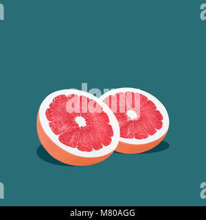 Grapefruit im Pop Art Stil mit zwei Hälften reifer Grapefruit liegen auf einem türkis Hintergrund Trendy Foto mit Text Raum sind Stockfoto