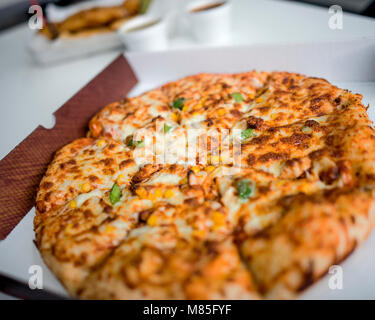 Pizza zum Mitnehmen in einer Box Stockfoto