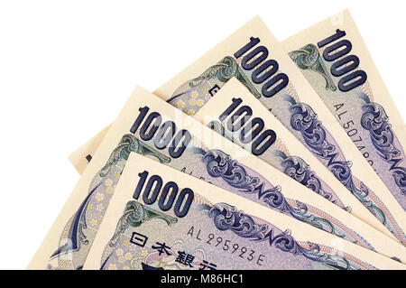 Mehrere japanische 1000 Yen Währung Rechnungen auf einem weißen Hintergrund. Stockfoto