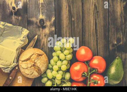 Gesundes Frühstück Zutaten, vegetarische Lebensmittel, Obst und Gemüse, Ansicht von oben, Kopie Raum Stockfoto