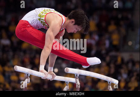 17 März 2018, Deutschland, Stuttgart: Turnen Wm, decicer, multi Herren- Disziplin, in der Porsche-Arena. Japans Yusuke Tanaka in Aktion auf der Bars. Foto: Marijan Murat/dpa Stockfoto