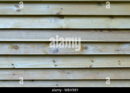 Wand aus brauner Holzlatten für Hintergrund oder Textur Stockfoto