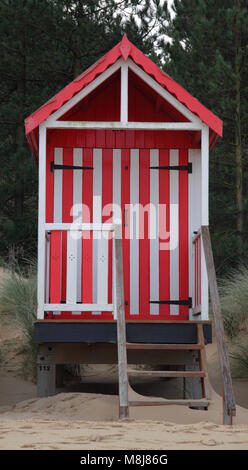 Beach Hut, Brunnen neben dem Meer Stockfoto