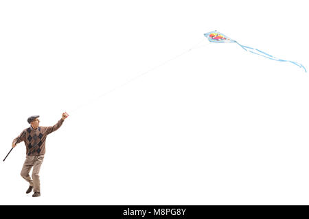 Senior flying a Kite auf weißem Hintergrund Stockfoto