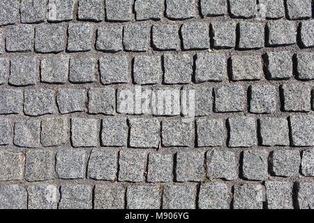 Granit grau Kopfsteinpflaster abstrakt Hintergrund Stockfoto