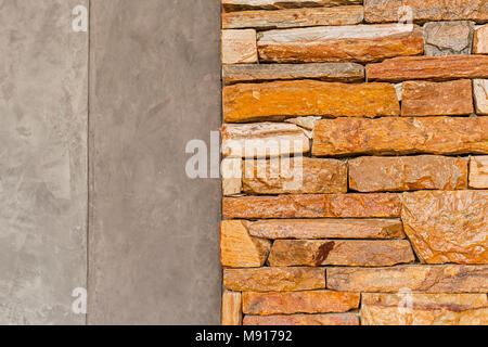 Wand aus Zement und Dekoration von Stein Steine. Stockfoto
