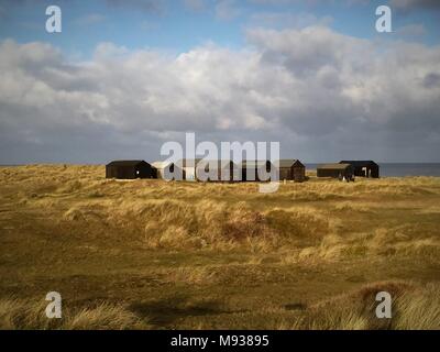 Schwarz gemalten Fischer wirft bei Winterton Dünen National Nature Reserve Norfolk UK Stockfoto