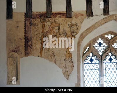 Edingthorpe Kirche, Norfolk hat seltene Gemälde aus dem 14. Jahrhundert im Norden Kirchenschiff Wand. Dies zeigt St Christopher. Stockfoto