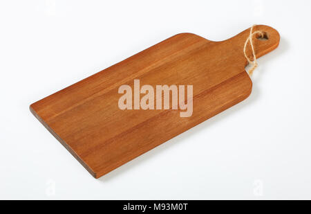 Holz Schneidebrett mit Griff und auf weißem Hintergrund string Stockfoto