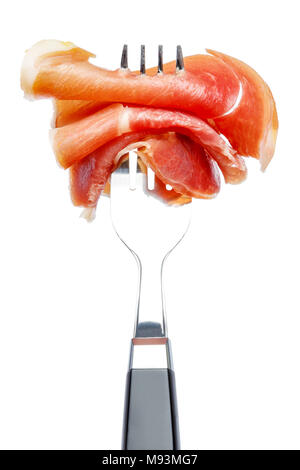 Italienische Prosciutto Crudo oder spanischer Jamon auf Gabel Stockfoto