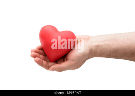 Rotes Herz in der Hand des Menschen Stockfoto