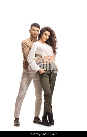 In voller Länge Porträt eines jungen Paares auf weißem Hintergrund Stockfoto