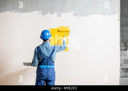 Workamn Malerei Wand im Innenbereich Stockfoto
