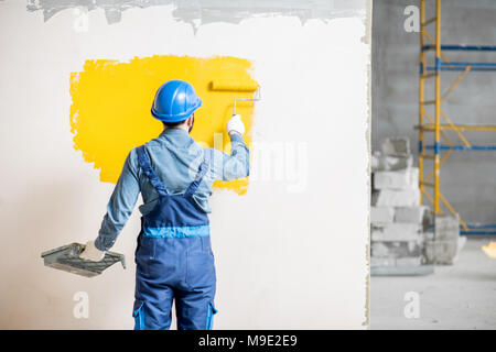 Workamn Malerei Wand im Innenbereich Stockfoto