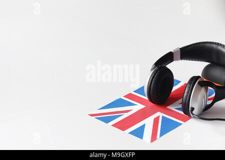 Das Erlernen von Fremdsprachen. Notepad für Einträge und eine Fahne. Lang Stockfoto