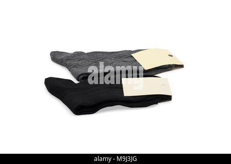 2 Paar Herren Socken, Schwarz und Grau. Auf weissem Hintergrund. Stockfoto