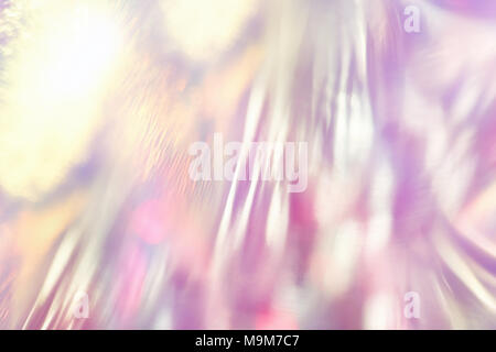 Abstrakte fancy lebendige holografische Folie Hintergrund mit glänzend schimmernde Reflektionen und glitzernden bokeh Lichteffekt. Stockfoto