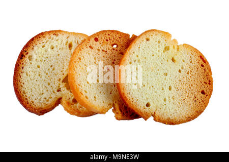 Drei knusprige Cracker auf weißem Hintergrund isoliert, Nahaufnahme, Ansicht von oben. Stockfoto