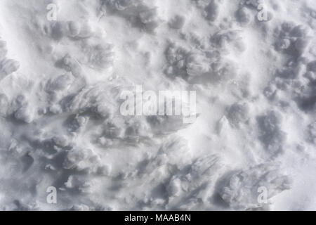 Hintergrund, Textur - holprige weiße Oberfläche des Berges Firn (Hart verkrusteten Schnee) Stockfoto