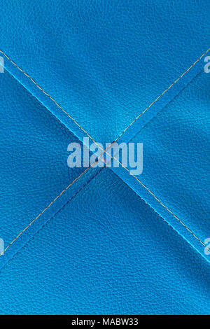 Blau Leder mit Heftung Textur und über Kreuz Symbol Stockfoto