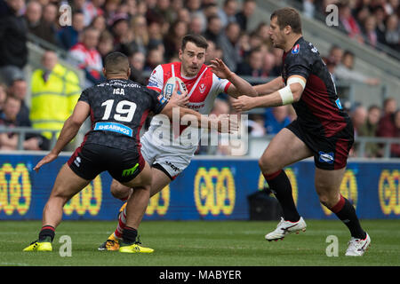 St. Helens Ryan Morgan wird von der Wigan Warriors Willie Isa am 30. März 2018, total Gottlosen Stadion, Merseyside, England; Betfred Super Leag angegangen Stockfoto