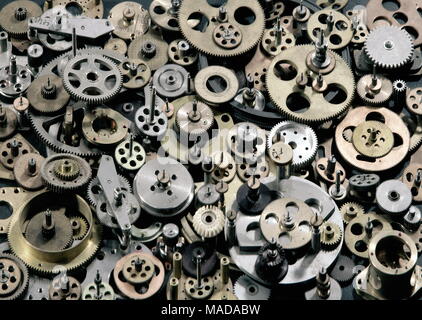 Getriebe und Zahnräder viele kleine, closeup Hintergrund. Stockfoto