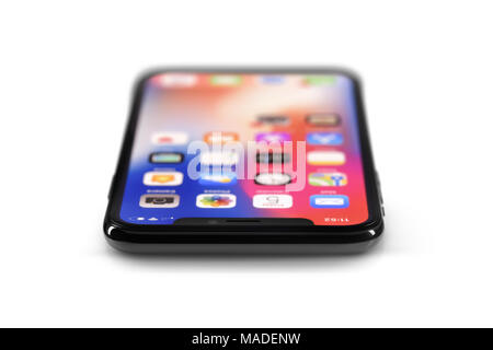 Apple iPhone X, großen Bildschirm smartphone, Produkt noch leben, horizontal in einem flachen Winkel auf weißem Hintergrund mit einen Freistellungspfad isoliert liegen. Stockfoto