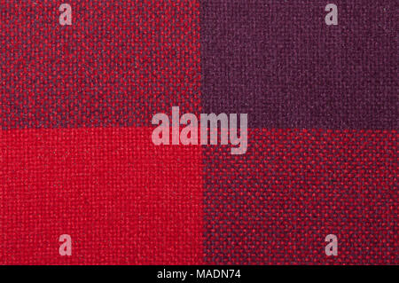 Mit einem Muster aus Quadraten von Schattierungen von rot texturiert Stockfoto