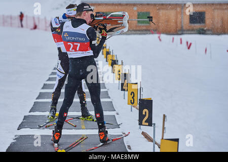 Lenzerheide, Schweiz, 1. April 2018. Laurin Fravi während der Herren Massenstart in der Schweizerischen und belgischen Nationalen Biathlon Meisterschaften Credit: Rolf Simeon/Alamy leben Nachrichten Stockfoto