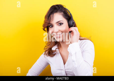 Schöne Frau als telemarketer Headset Stockfoto