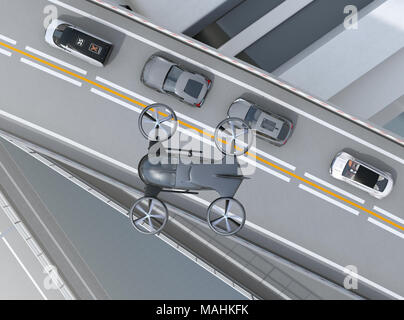 Blick von oben auf die schwarzen Drohne fliegen über Autos in Heavy Traffic Jam. Konzept für die drohne Taxi. 3D-Bild. Stockfoto