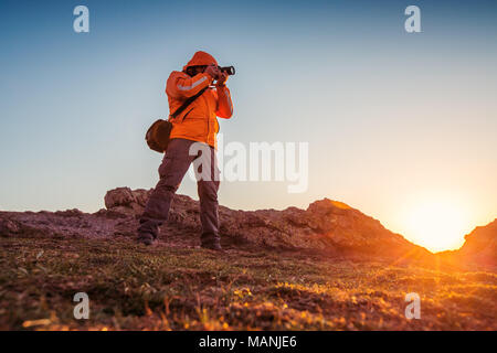 Natur Fotograf die Bilder in den Bergen Sonnenaufgang Stockfoto