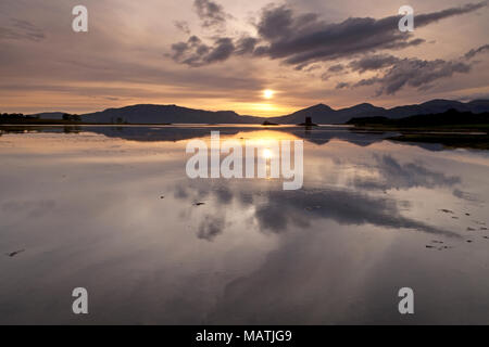 Sonnenuntergang am Loch Laich, in der Nähe von Port Appin in den westlichen Highlands von Schottland. Stockfoto