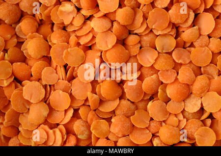 Overhead close up (Makro) Schuss rote Linsen, Füllung frame a essen Hintergrund Textur zu erstellen. Stockfoto