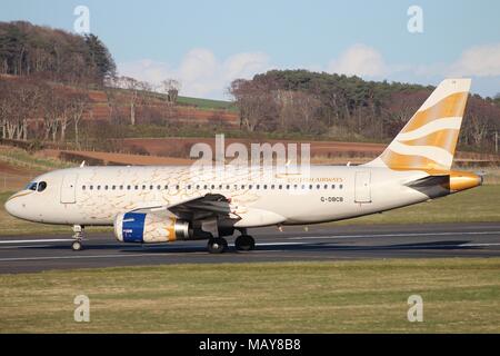 G-DBCB, ein Airbus A 319-131 der British Airways, in "Die Taube" besondere Farbgestaltung, am Flughafen Prestwick, Ayrshire. Stockfoto