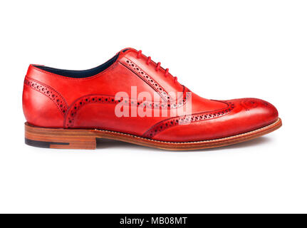 Studio Aufnahme eines Mans rot Leder brogue isoliert auf Weiss - Johannes Gollop Stockfoto
