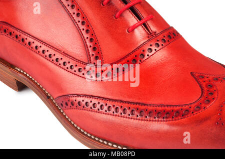 Studio Aufnahme eines Mans rot Leder brogue isoliert auf Weiss - Johannes Gollop Stockfoto