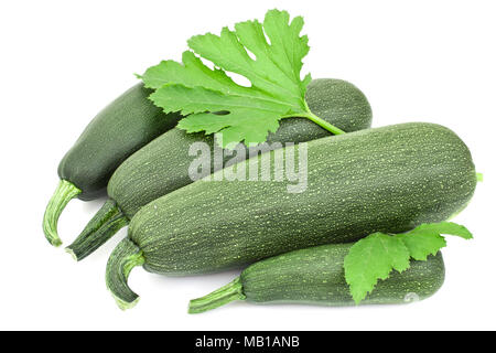 Vier große Zucchini auf weißem Hintergrund Stockfoto