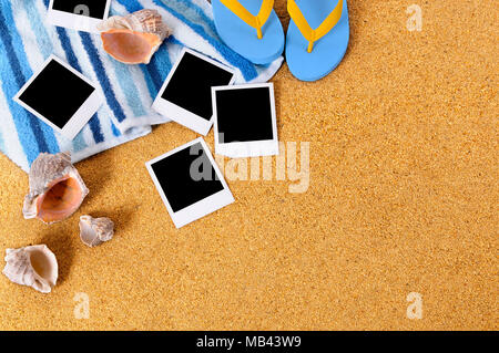 Beach background with blank photo prints, seashells, beach towel, flip flops and starfish Stockfoto