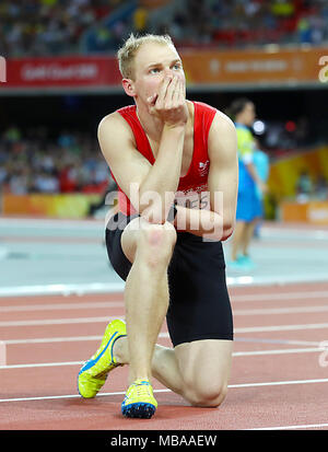 Wales' Rhys Jones reagiert, nachdem Sie 7. Bei den Herren T38 100 m-Finale bei den Carrara Stadion bei Tag fünf der Commonwealth Games 2018 in der Gold Coast, Australien. Stockfoto