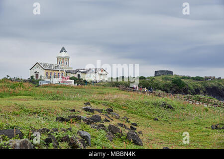 Jeju, Korea - 23. Mai 2017: Seopjikoji ist ein Kap am Ende der östlichen Ufer der Insel Jeju. Der Ort ist berühmt für die Dreharbeiten der Kinos ein Stockfoto