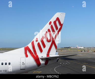 Schwanz einer Jungfrau Boeing 737-800 Flugzeuge am Flughafen Sydney, Australien Stockfoto