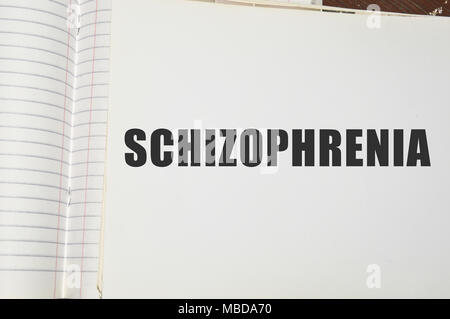 Schizophrenie Wort auf weißem Papier Stockfoto