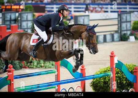 Olympische Spiele 2008, Hong Kong (Peking Spiele) August 2008, Kenneth Cheng (HKG) Reiten, Springreiten erste Qualifikationsrunde Stockfoto
