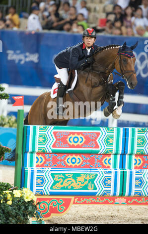 Olympische Spiele 2008, Hong Kong (Peking Spiele) August 2008, Kenneth Cheng (HKG) Reiten, Springreiten erste Qualifikationsrunde Stockfoto