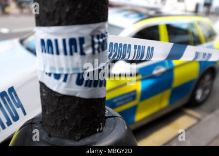 London, England-Police Linie, nicht kreuzen - Crime Scene Investigation - selektive Fokus Stockfoto