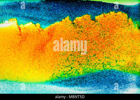 Bunte sand Pigmente fiel in Wasser. Abstrakte Landschaft Hintergrund. Stockfoto