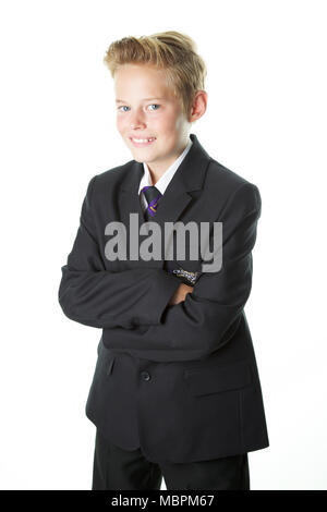 Happy Boy in Schuluniform Stockfoto